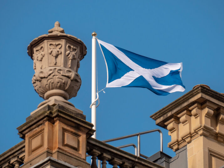 Scottish flag (blue with a white cross) on top of a building