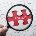 Jigsaw with missing piece that says Policy